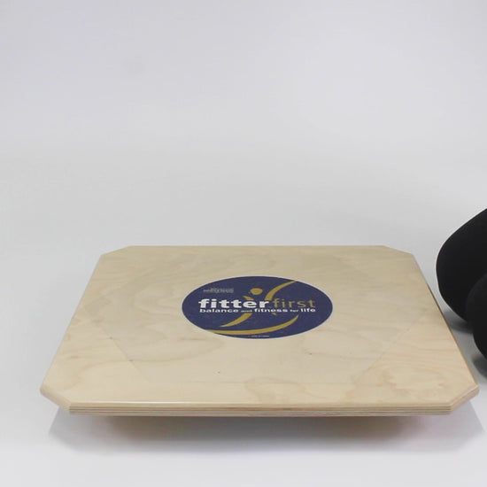 Height adjustable balance board for seniors. Three levels of difficulty for less steep and more steep angles and rehab